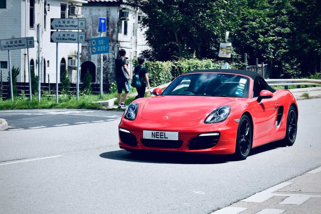 red sports car on road